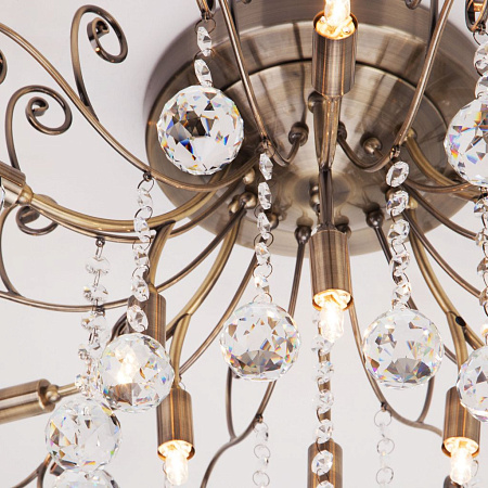 Потолочная люстра Eurosvet Vita 10042/12 античная бронза/прозрачный хрусталь 00000076379 Потолочная люстра Eurosvet Vita 10042/12 античная бронза/прозрачный хрусталь 00000076379